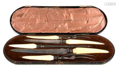 A cased five piece carving set with turned ivory handles, by Francis Newton Sheffield. The case is