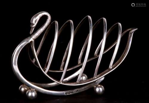 A silver four slice toast rack in the form of a swan. Sheffield 1908, marker mark for T.Levesley,