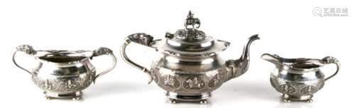 A silver three-piece tea set by T.P.R. & Co. of Bombay, probably late 19th century. The teapot,