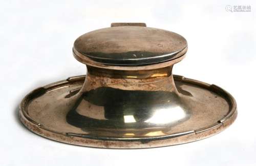 An silver Capstan inkwell of oval form, Birmingham 1939, with clear glass liner, 14cm( 5.5 ins)