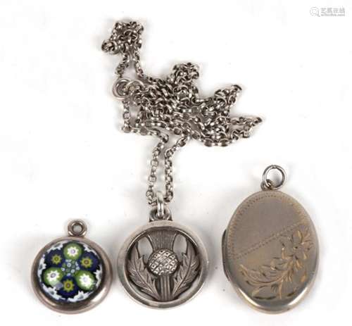 A group of Scottish silver pendants and brooches to include Caithness and Iona examples.