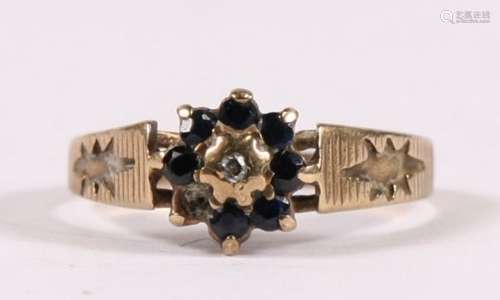 A 9ct gold sapphire & diamond cluster ring, approx UK size 'L'.