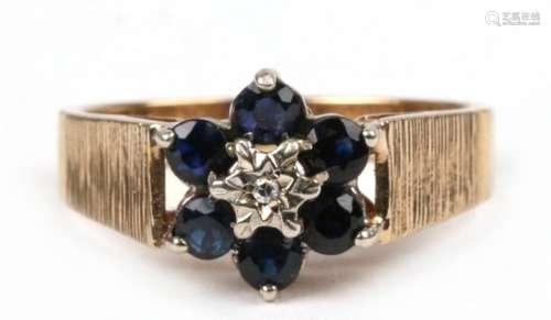 A 9ct gold sapphire and diamond cluster ring, approx UK size 'P'.