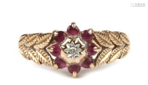 A 9ct gold ruby and diamond cluster ring, approx UK size 'O'.