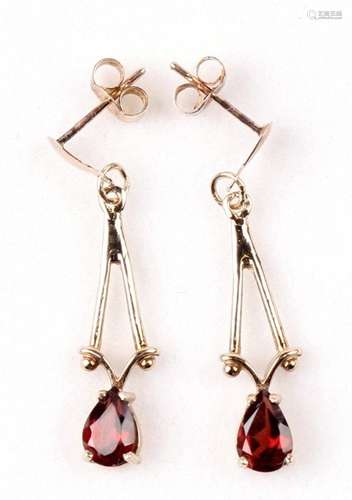 A pair of 9ct gold garnet earrings.