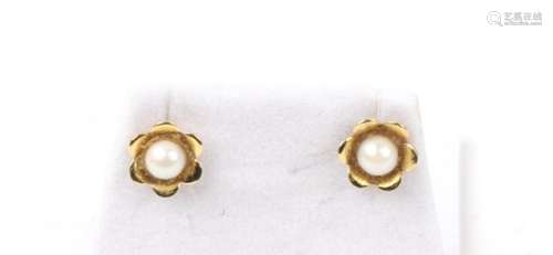 A pair of 9ct gold and pearl flower earrings.