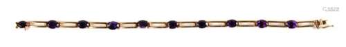 A 14ct gold bracelet, set with ten amethysts. 10.1g. 18cm (7 ins) long