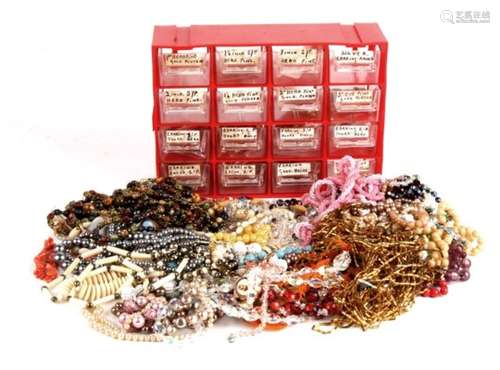 A quantity of costume jewellery; together with a quantity of jewellers earring makers spares.