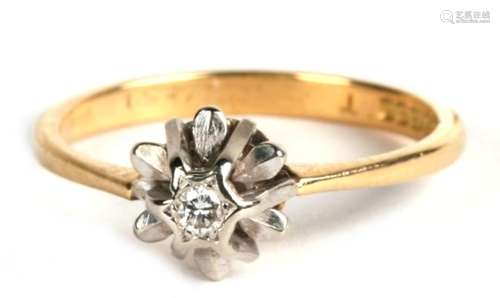 An 18ct gold and raised diamond solitaire ring, 3.0g. Approx. UK size N.