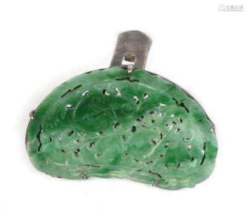 A Chinese pierced figured jade collar clip, 3cms (1.1ins) wide.