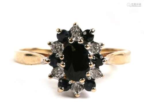 A 9ct gold, diamond and black spinel snowflake effect ring, 2.0g. Approx.UK size M.