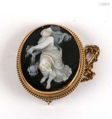 A deep carved 19th century two colour hardstone brooch in Etruscan style 15ct gold mount,