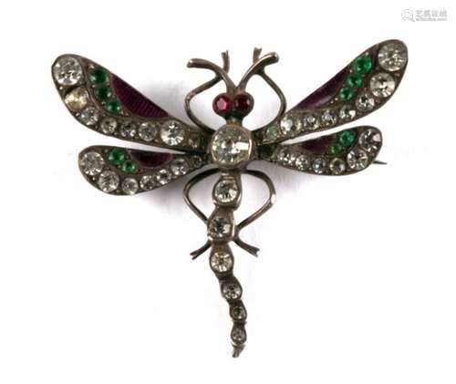 An early 20th century unmarked silver brooch in the form of a dragonfly, set to the wings and body