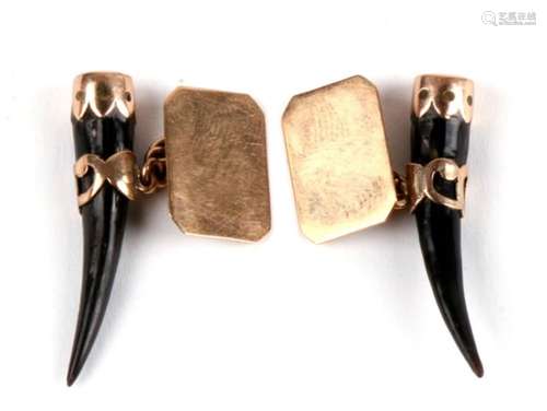 A pair of boxed 9ct gold cufflinks, with gold mounted horn fitting attached by chain to a plain