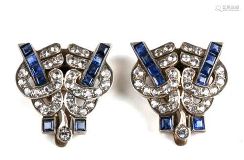 A pair of Art Deco dress clips, in silver with gold wash to the rear, set with blue and white stones