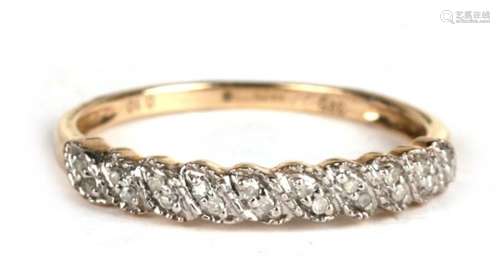 A 9ct gold diamond half eternity ring, approx UK size 'P'.