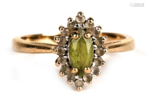 A 9ct gold diamond and peridot cluster ring, approx UK size 'O'.