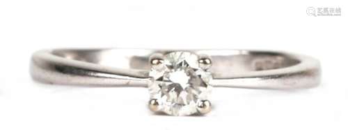 A 9ct white gold diamond solitaire ring, approx UK size 'K'.