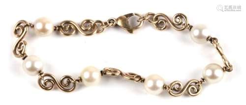 A 9ct gold and pearl bracelet. 10.2g.