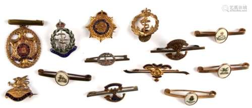 A collection of military sweetheart brooches.