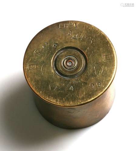 A Boer War brass shell case, dated on the base 17. 4. 99. Height 5cms (2ins) by 6.5cms (2.5ins)