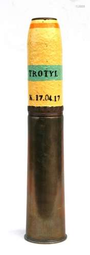 A complete inert WW1 artillery shell in three parts. Marked 1917 on shell head and brass case.