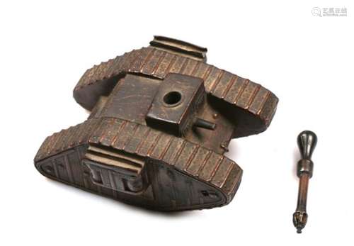 A rare 1919 table petrol striker lighter in the form of a WW1 Tank. Marked to the underside: LVA C