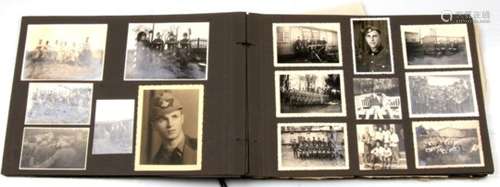 A WW2 Third Reich personal photograph album containing in excess of 100 original photos of Hitler