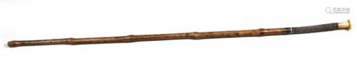 A 19th century Sword Stick (originally a coaching whip), having a cane shaft with a concealed