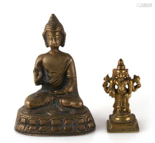 A cast brass Buddha seated in meditation, 14cms (5.5ins) high; together with an Indian brass