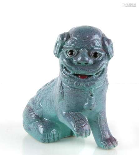 A robins egg glaze Chinese fo dog, 17cms (6.75ins) high.Condition Report Repair to the front left