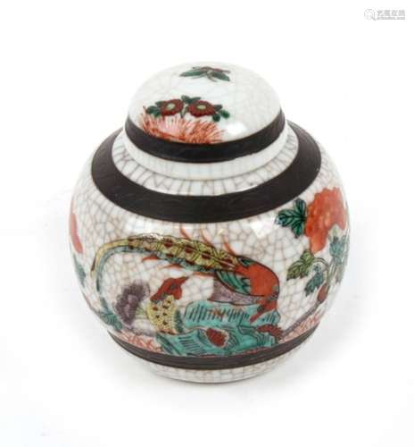 A Chinese crackle glaze ginger jar, decorated a bird and flowers, red seal mark to the underside.