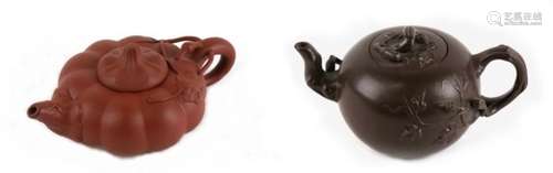 Two Chinese Yixing teapots, one of compressed pumpkin form, 9cms (3.5ins) diameter the other of