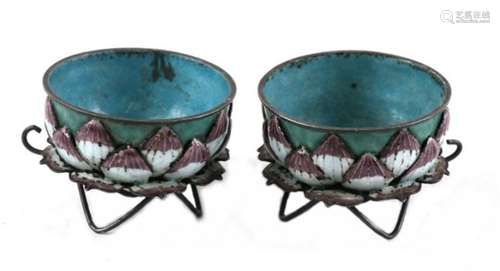 A pair of Chinese white metal and enamel lotus flower cups, 4cms (1.5ins) diameter (2).