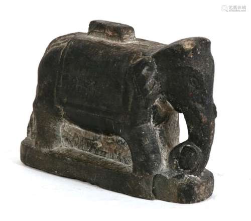 An antique Indian carved stone elephant base, 10cms (4ins) high.