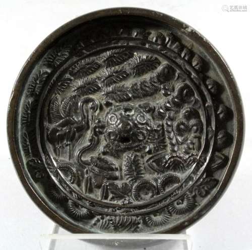 A Chinese bronze mirror