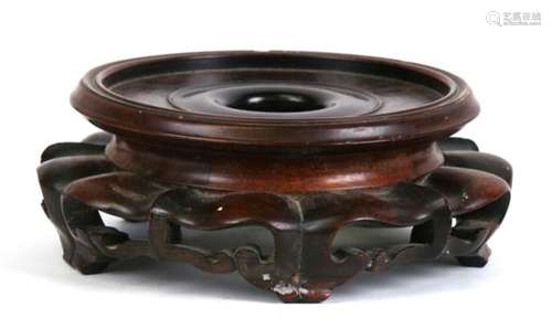 A large Chinese hardwood vase stand, 19cms (7.5ins) diameter.