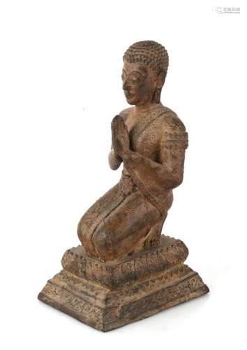 A large 19th century Thai bronze figure of Buddha kneeling at prayer. 22cm (8.75 ins) high.