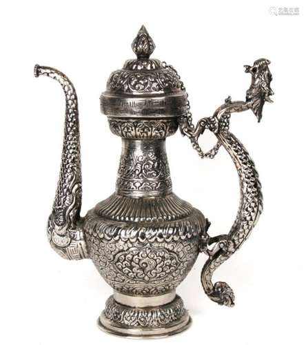 A large Chinese silver coloured metal wine pot with dragon handle. 35cm 13.75ins high.