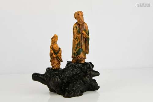 Two Carved Tianhuang Figures