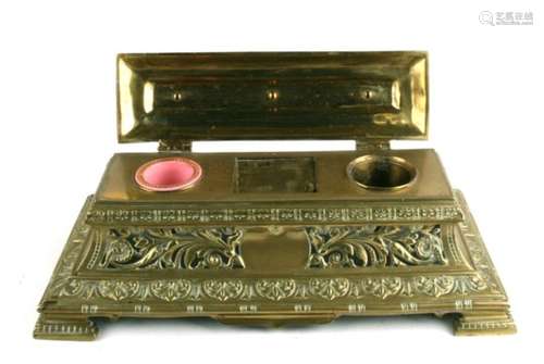 A Victorian brass desk stand with pierced foliate decoration, 38cms (15ins) wide.Condition Report