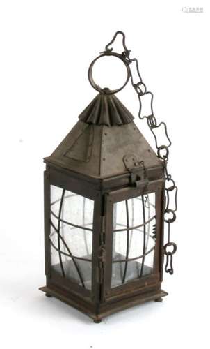 An Arts & Crafts copper hall lantern, 43cms (16.75ins) high.Condition Report Lacking two glass