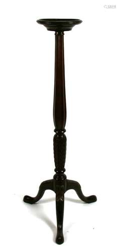 A late 19th century mahogany torche on turned column and tripod base.