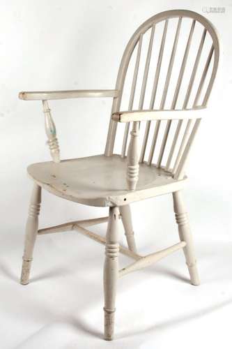 A painted stick back Windsor armchair.