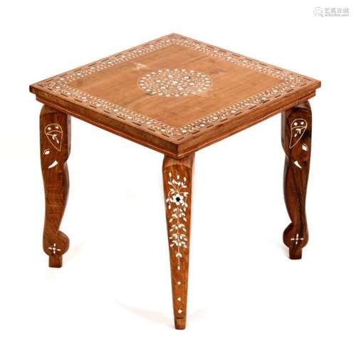 An Indian hardwood inlaid occasional table, 36cms (14.25ins) wide.