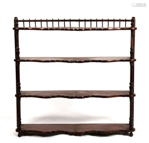 A set of 19th century mahogany four-tier open wall shelves, 80cms (31.5ins) wide.