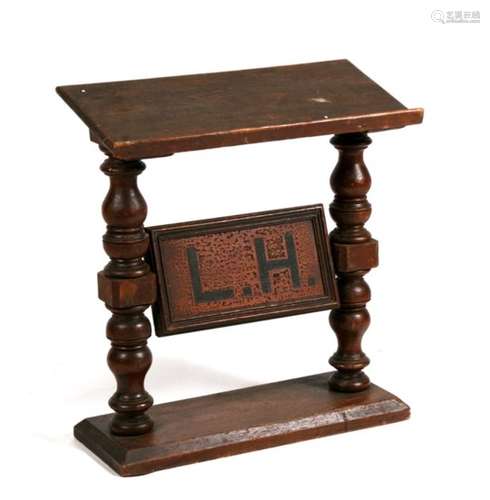 A Victorian Masonic lectern, the sloped top on turned columns with rectangular revolving plaque,