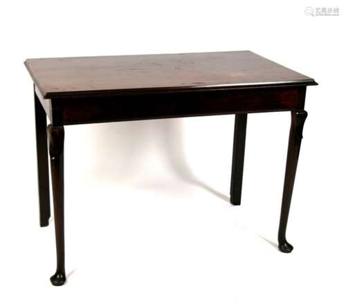 A mahogany serving table on turned front supports with pad feet, 100cms (39.25ins) wide.