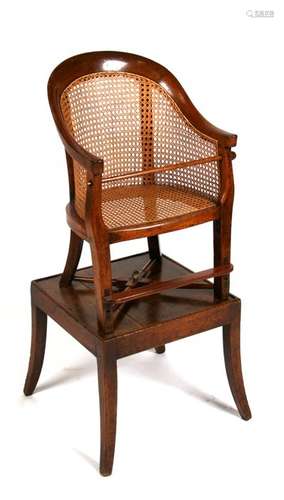 A 19th century child's metamorphic high chair with bergere caned back and seat.