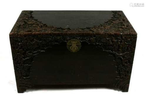 A Chinese carved camphorwood trunk, 101cms (39.5ins) wide.